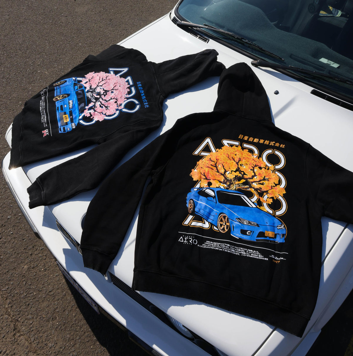 The UJELUS Hoodie, black heavyweight hoodie with blue S15 rear graphic (view 2)